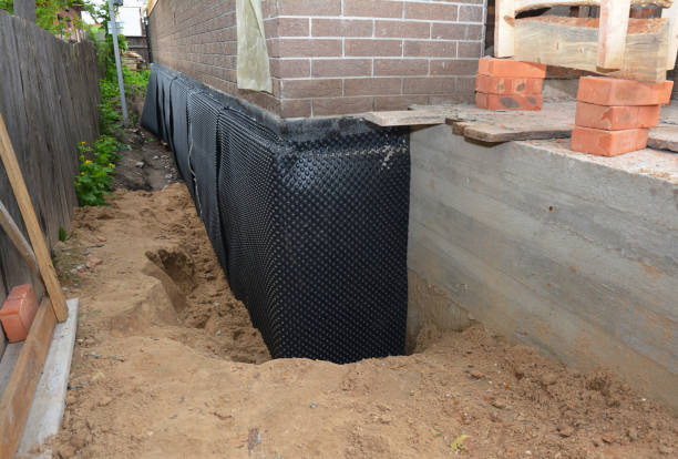 Happy homeowners after waterproofing job in Shepardsville